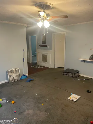 a view of a livingroom with furniture