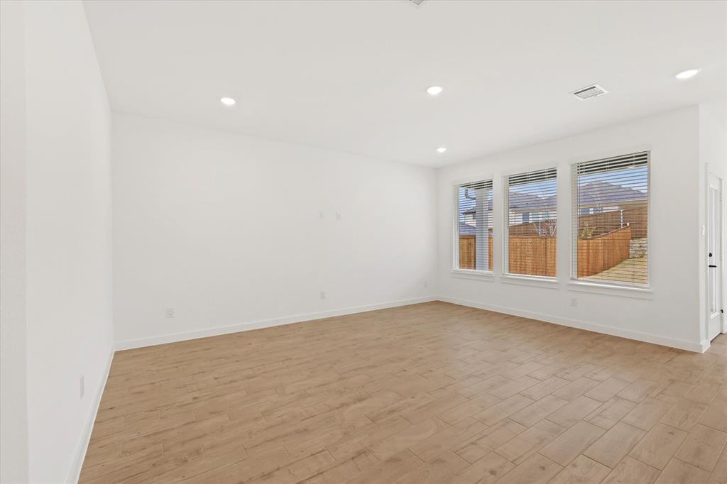7136 Intrepid Drive Fort Worth, TX 76179 - Photo 11 of 31 an empty room with a empty space and windows
