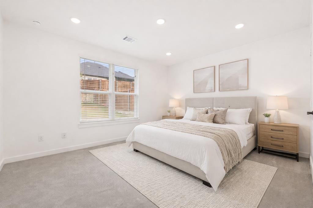 7136 Intrepid Drive Fort Worth, TX 76179 - Photo 14 of 31 a bedroom with a large bed and a window