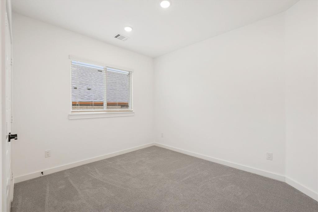 7136 Intrepid Drive Fort Worth, TX 76179 - Photo 15 of 30 an empty room with a workbench