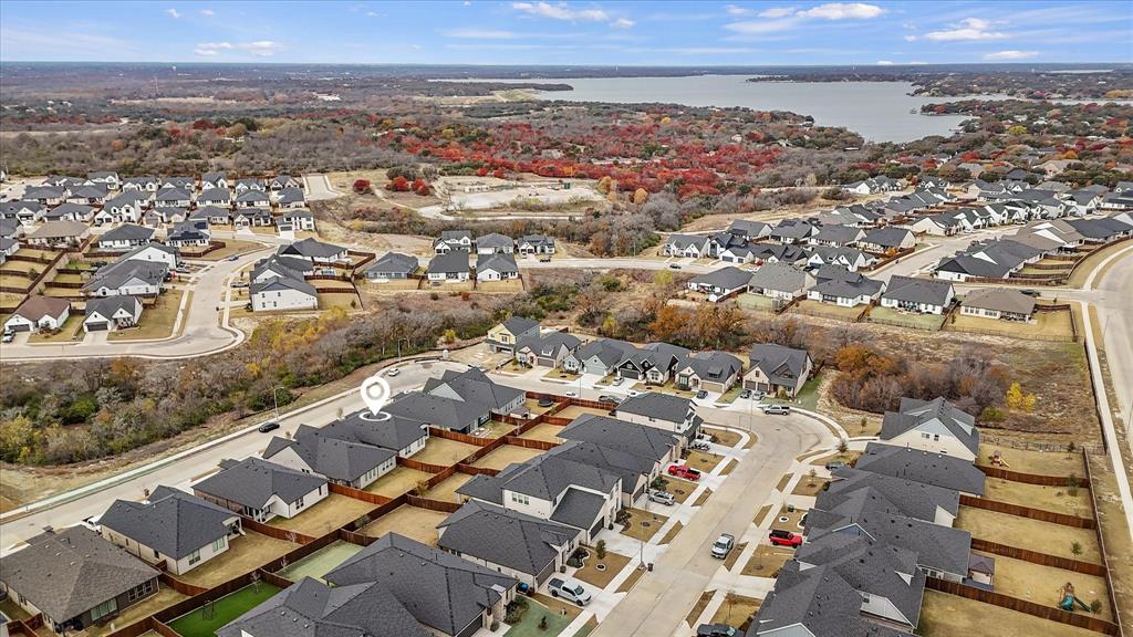 7136 Intrepid Drive Fort Worth, TX 76179 - Photo 31 of 31 an aerial view of residential building with parking