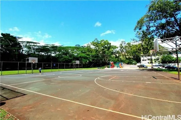 a view of a swimming pool with an outdoor space and seating area