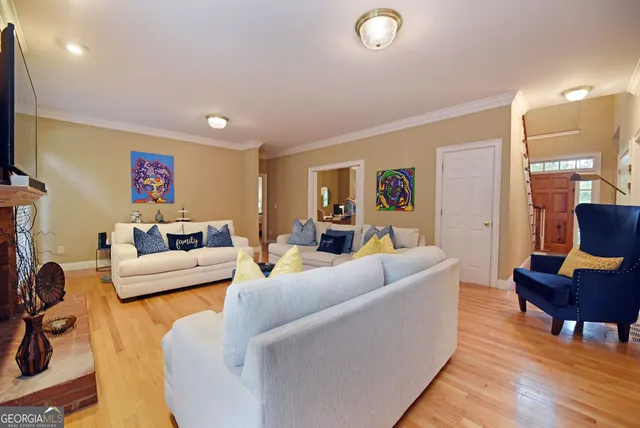a kitchen with stainless steel appliances granite countertop a stove and a refrigerator