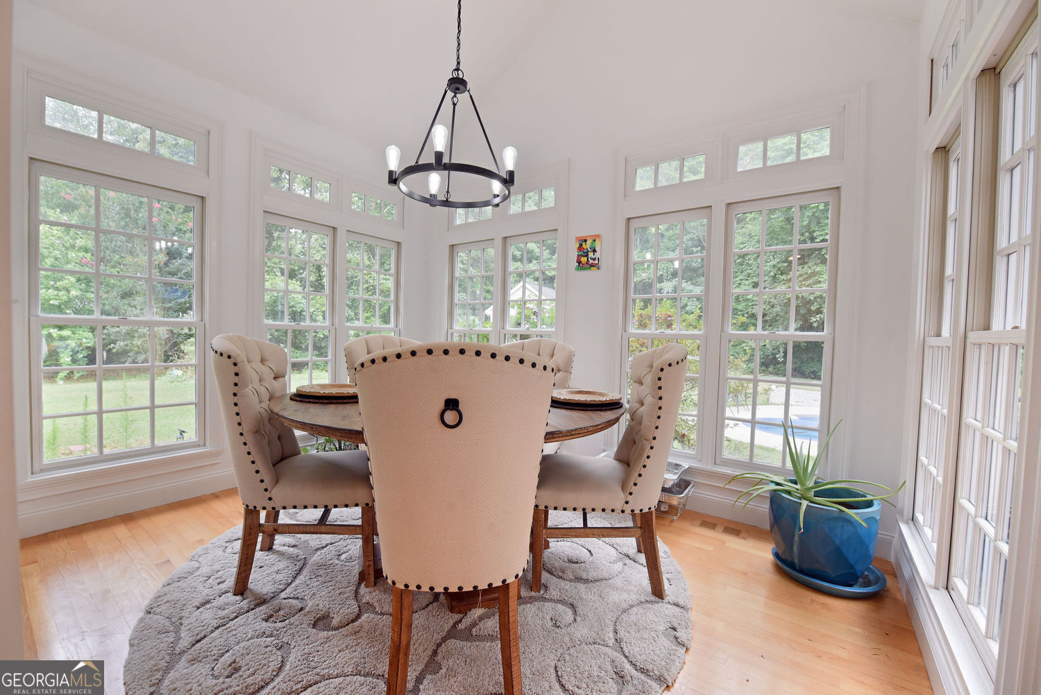 919 Deer Chase Toccoa, GA 30577 - Photo 19 of 62 a view of a dining room with furniture window and wooden floor