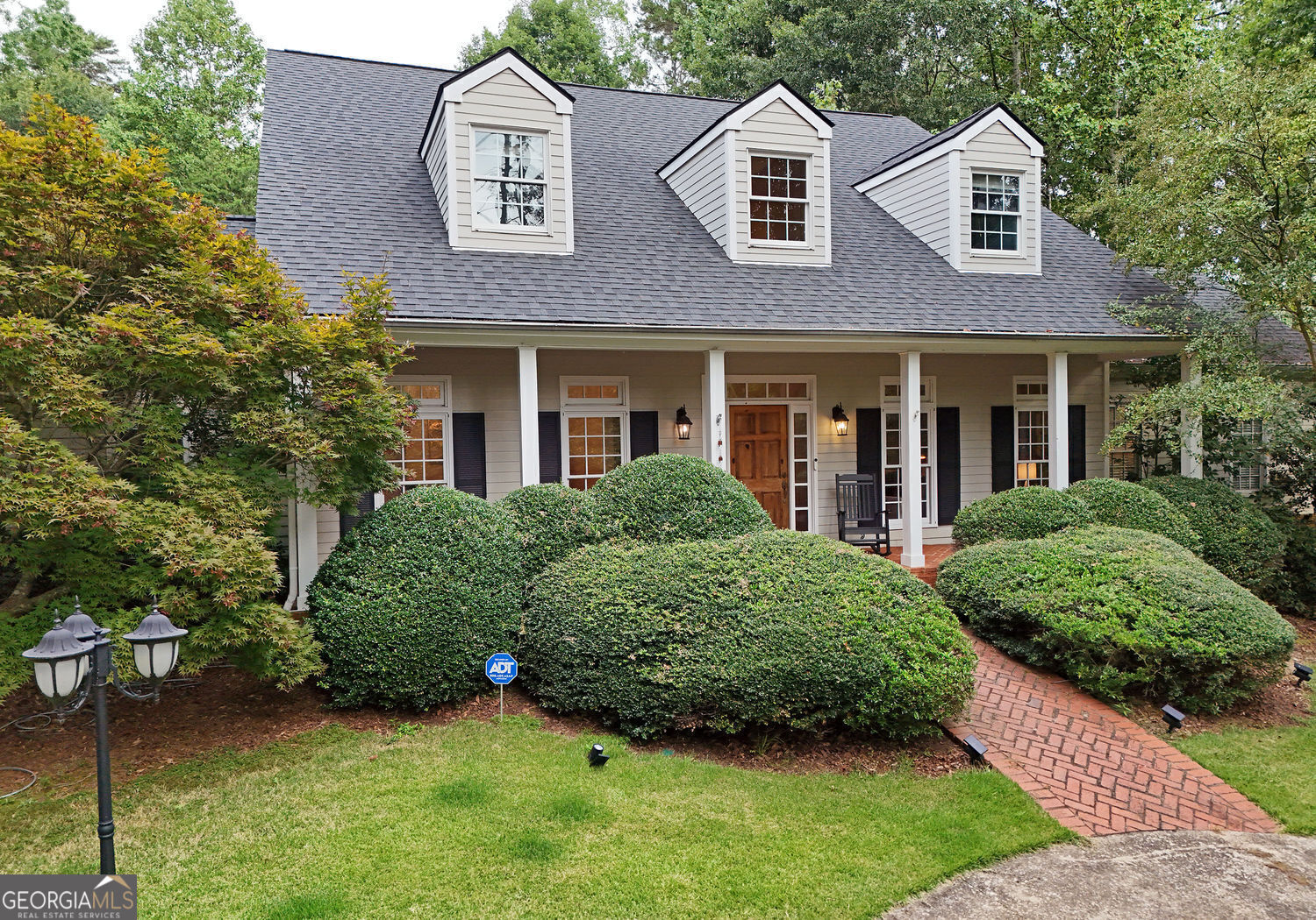 919 Deer Chase Toccoa, GA 30577 - Photo 2 of 62 a front view of a house with a garden