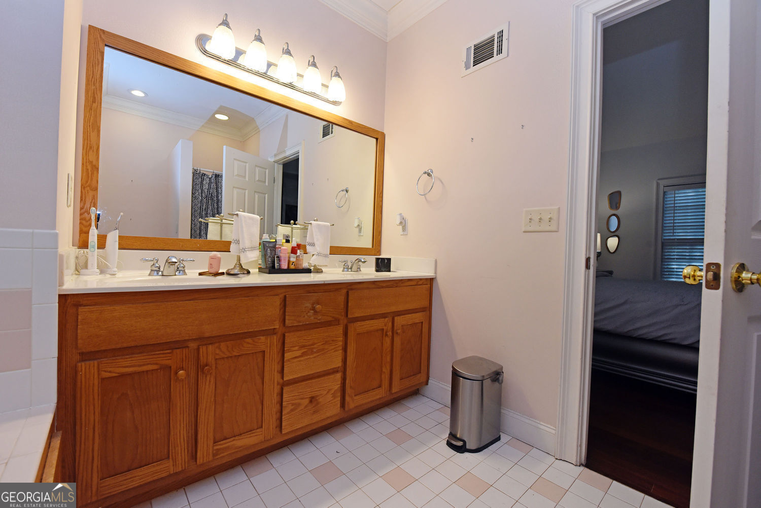 919 Deer Chase Toccoa, GA 30577 - Photo 28 of 62 a bathroom with a sink and a mirror