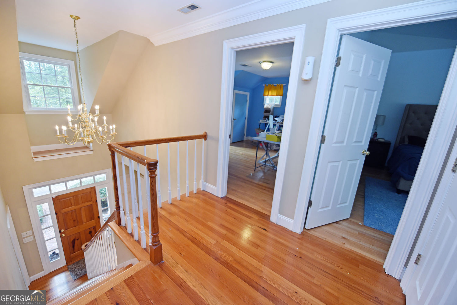 919 Deer Chase Toccoa, GA 30577 - Photo 29 of 62 a view of a livingroom with wooden floor and staircase