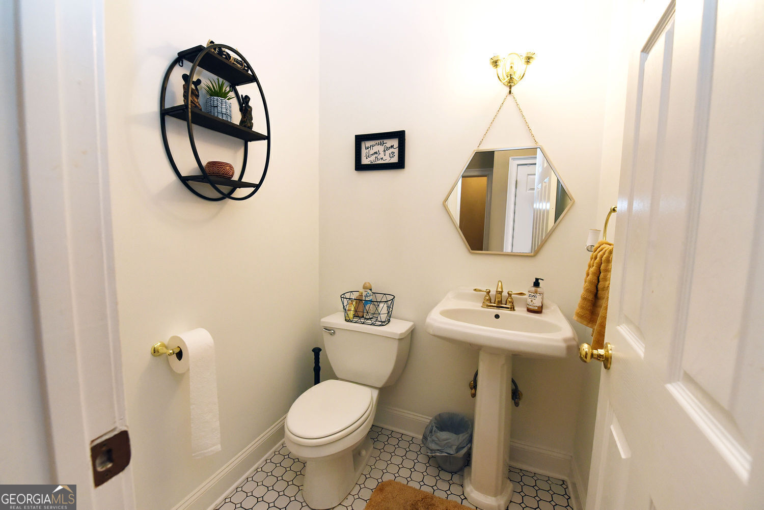 919 Deer Chase Toccoa, GA 30577 - Photo 40 of 62 a bathroom with a toilet sink and mirror