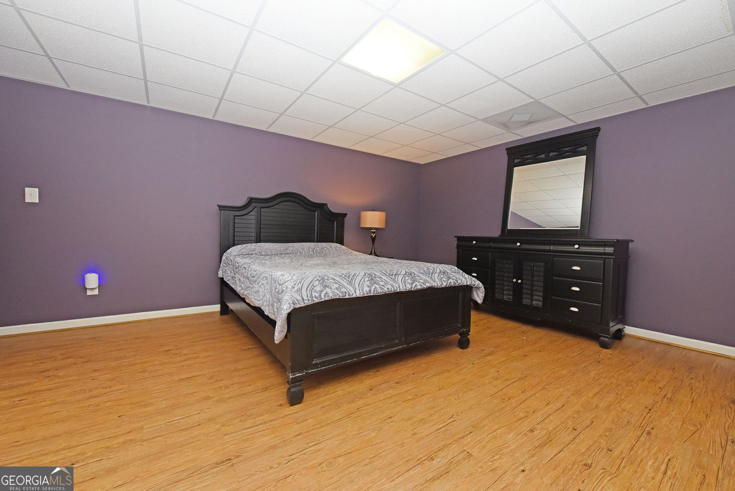 919 Deer Chase Toccoa, GA 30577 - Photo 47 of 62 a bedroom with a bed and a dresser