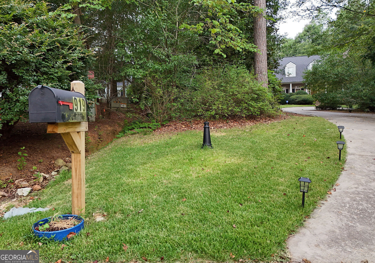 919 Deer Chase Toccoa, GA 30577 - Photo 50 of 62 a view of a garden with a tree