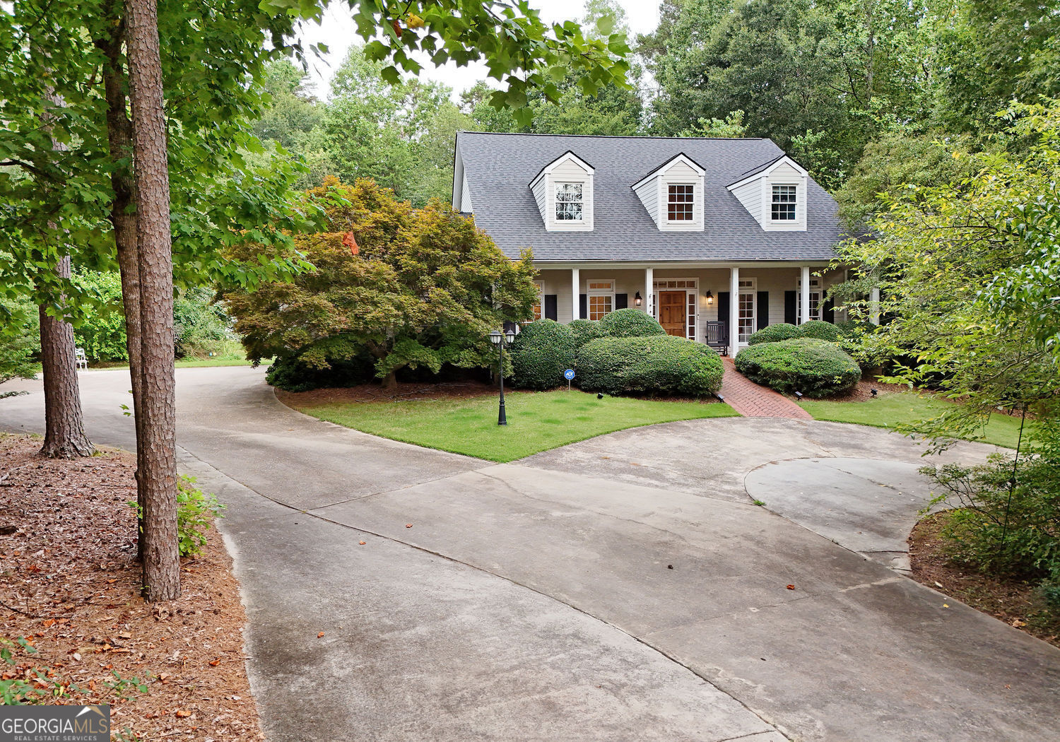 919 Deer Chase Toccoa, GA 30577 - Photo 5 of 62 a front view of a house with a yard and garage