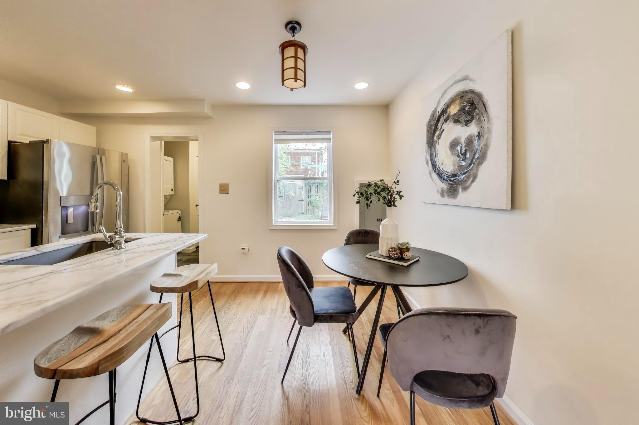 3357 Clay Place Northeast Washington, DC 20019 - Photo 4 of 16 a view of a dining room with furniture and a chandelier