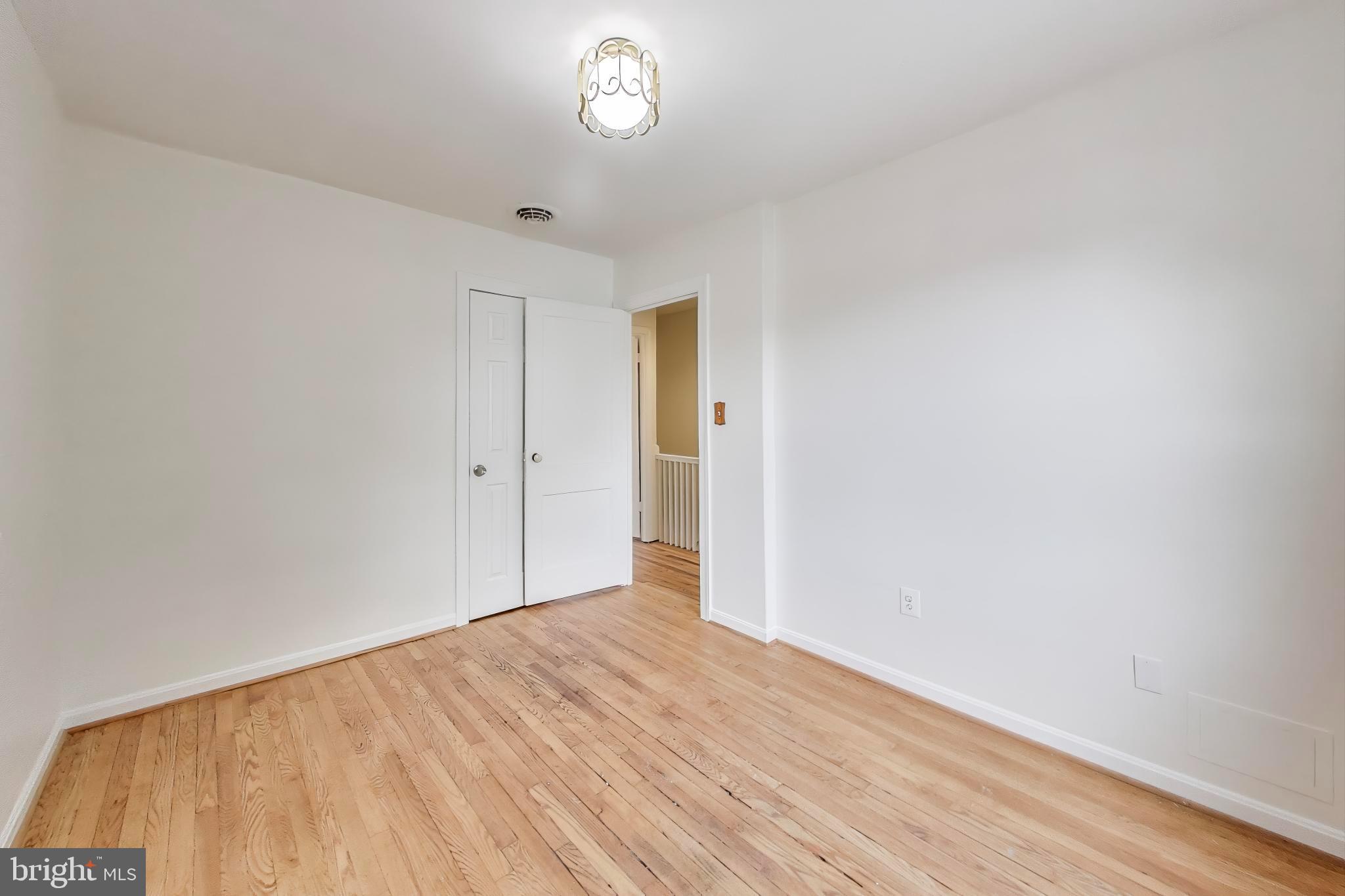 3357 Clay Place Northeast Washington, DC 20019 - Photo 10 of 16 a view of empty room with wooden floor