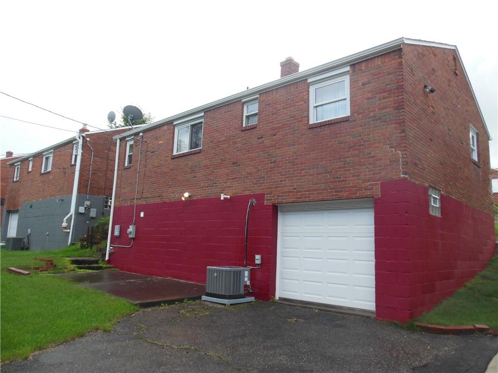 166 Castle Road Pittsburgh, PA 15234 - Photo 3 of 14 a front view of house with yard