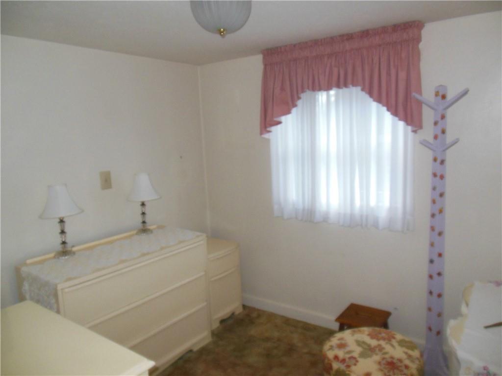 166 Castle Road Pittsburgh, PA 15234 - Photo 9 of 14 a bathroom with a sink and a mirror