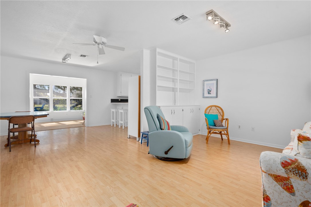 302 Fulton Avenue Rockport, TX 78382 - Photo 6 of 34 a living room with furniture and a window