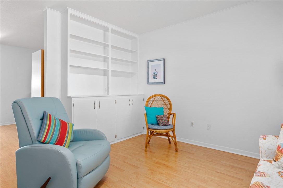 302 Fulton Avenue Rockport, TX 78382 - Photo 7 of 34 a living room with furniture and a window