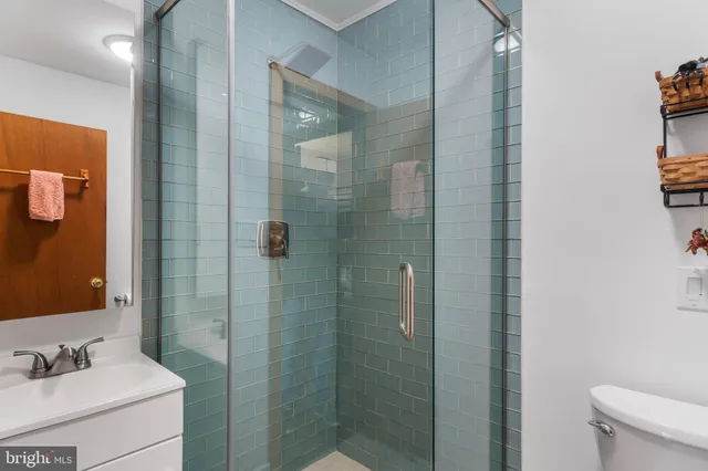 a view of staircase with wooden floor