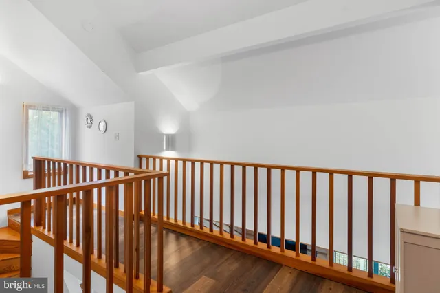 a bed room with a bed and a chandelier