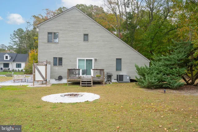 a view of a swimming pool with a lounge chairs