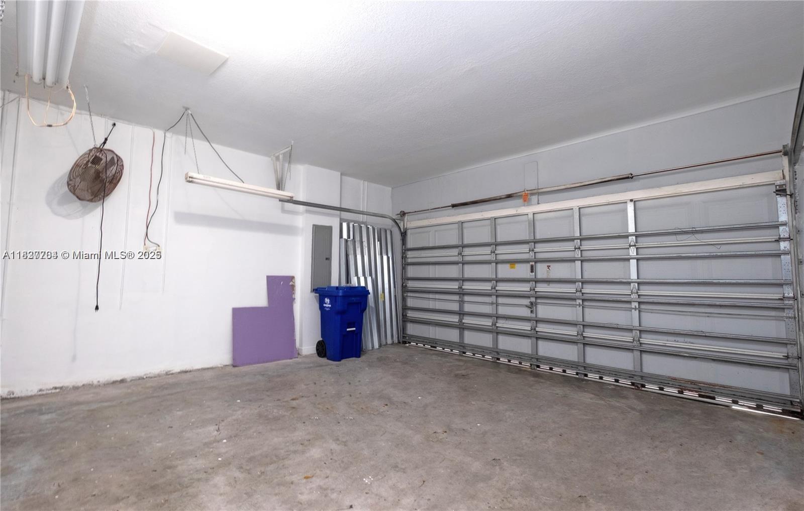 Miramar Patio Homes Miramar, FL 33027 - Photo 40 of 43 a view of a garage