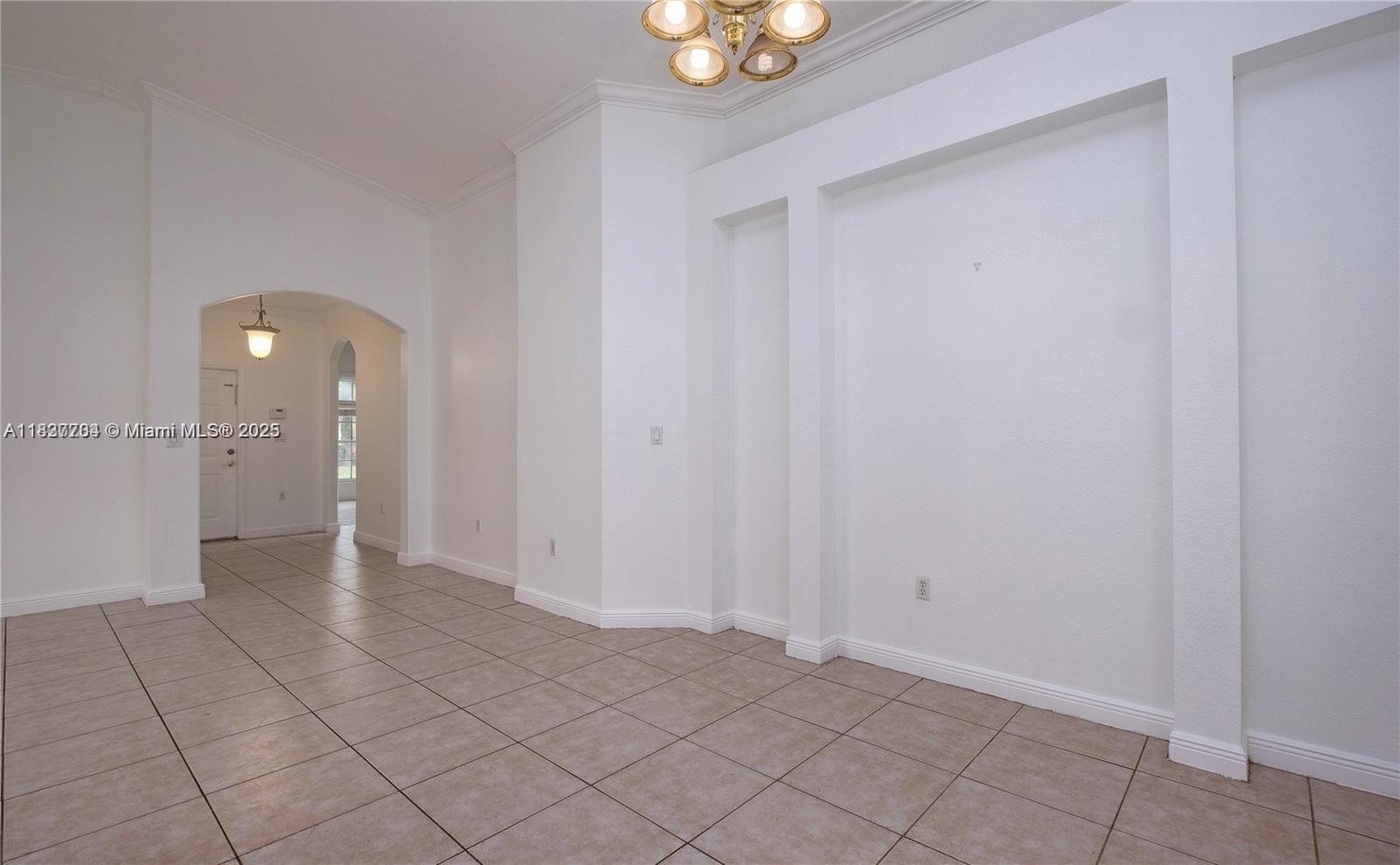Miramar Patio Homes Miramar, FL 33027 - Photo 10 of 43 a view of an empty room and closet area