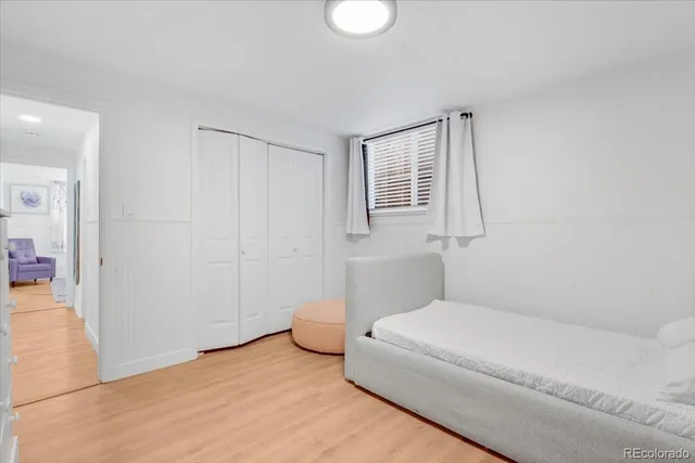 a bathroom with a toilet sink and shower