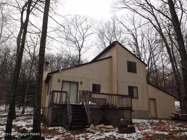 833 Canterbury Road Bushkill, PA 18324 - Photo 3 of 9 a view of a house with a yard