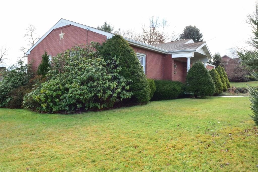 2754 Brodhead Road Aliquippa, PA 15001 - Photo 22 of 24 Mature landscaping frames the home