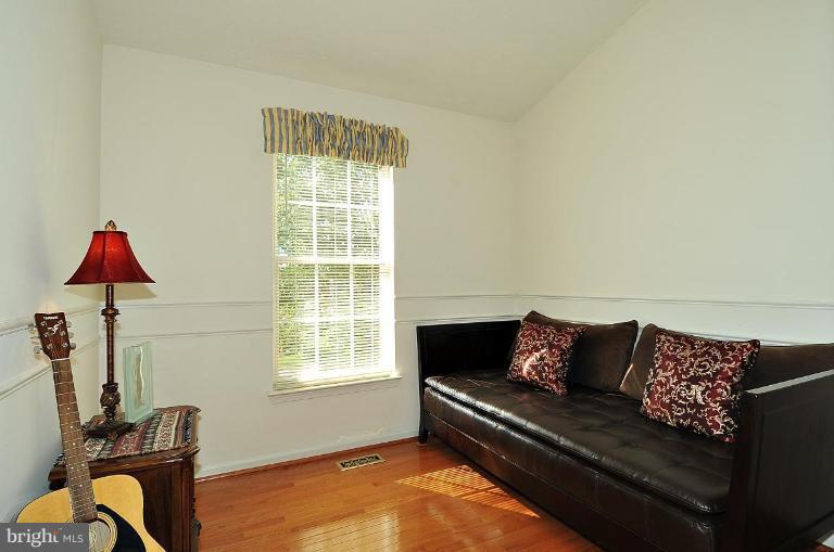 6116 Starburn Path Columbia, MD 21045 - Photo 7 of 18 a living room with furniture and a window