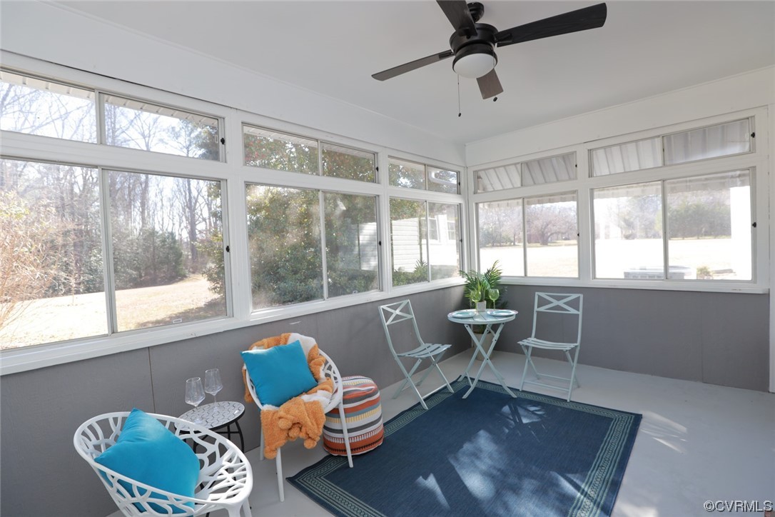 4321 Tatum Road Disputanta, VA 23842 - Photo 34 of 43 a living room with furniture and a window