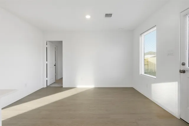 an empty room with windows