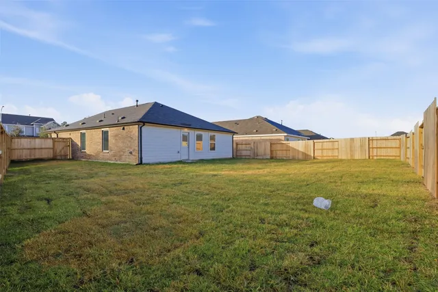 a house view with a garden space