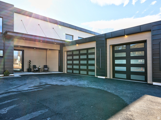 1306 East Victor Lane Draper, UT 84020 - Photo 4 of 60 Garage with driveway