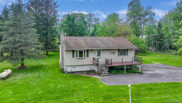a view of a patio in backyard