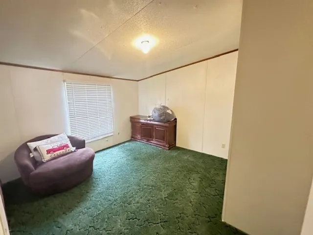 a bathroom with a sink and mirror with toilet