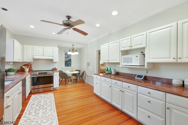 15 Georgian Road Morristown, NJ 07960 - Photo 11 of 44 a large kitchen with stainless steel appliances lots of counter space sink and cabinets