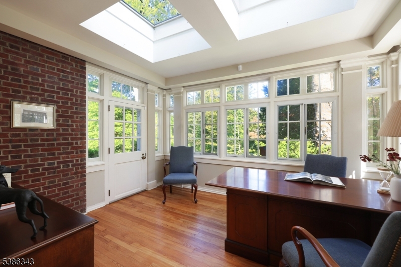 15 Georgian Road Morristown, NJ 07960 - Photo 13 of 44 a view of a livingroom with workspace and a window