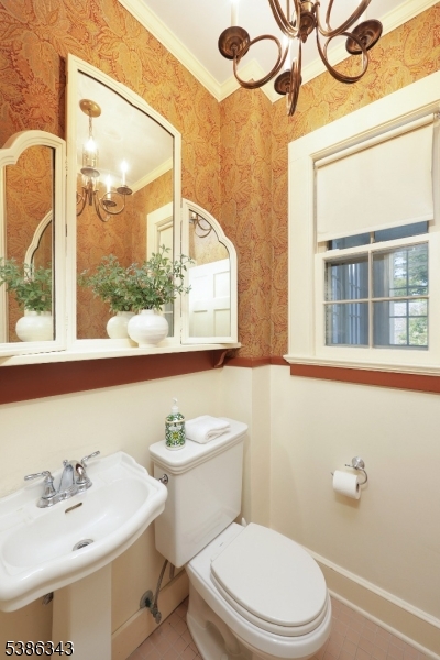 15 Georgian Road Morristown, NJ 07960 - Photo 14 of 44 a bathroom with a sink a toilet and a mirror