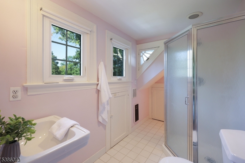 15 Georgian Road Morristown, NJ 07960 - Photo 29 of 44 a bathroom with a bathtub and shower