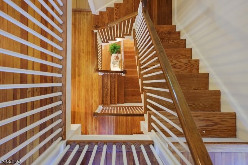 15 Georgian Road Morristown, NJ 07960 - Photo 31 of 44 a view of a staircase and wooden floor