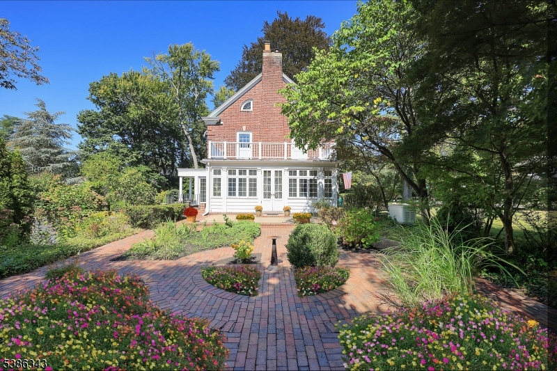 15 Georgian Road Morristown, NJ 07960 - Photo 32 of 44 a view of a house with a yard and garden