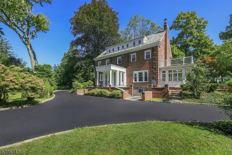 15 Georgian Road Morristown, NJ 07960 - Photo 34 of 44 a front view of a house with yard and green space