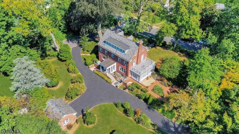 15 Georgian Road Morristown, NJ 07960 - Photo 36 of 44 an aerial view of a house with a yard swimming pool a patio and outer view