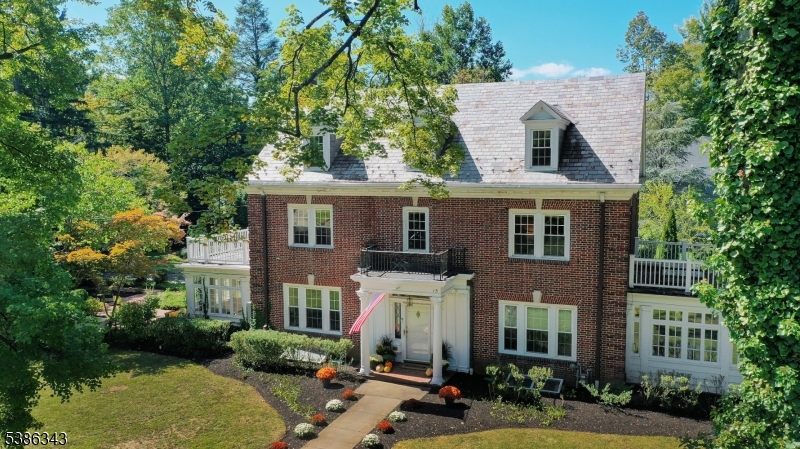 15 Georgian Road Morristown, NJ 07960 - Photo 40 of 44 a front view of a house with yard and green space