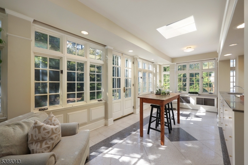15 Georgian Road Morristown, NJ 07960 - Photo 7 of 44 a living room with furniture and a large window