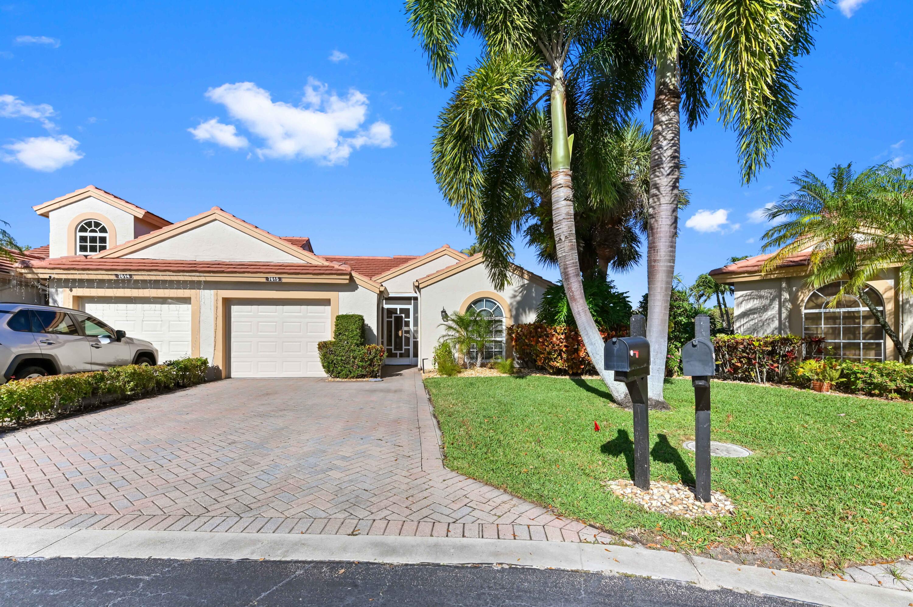 7615 Red Ruby Drive Delray Beach, FL 33446 - Photo 1 of 33 01 front 01
