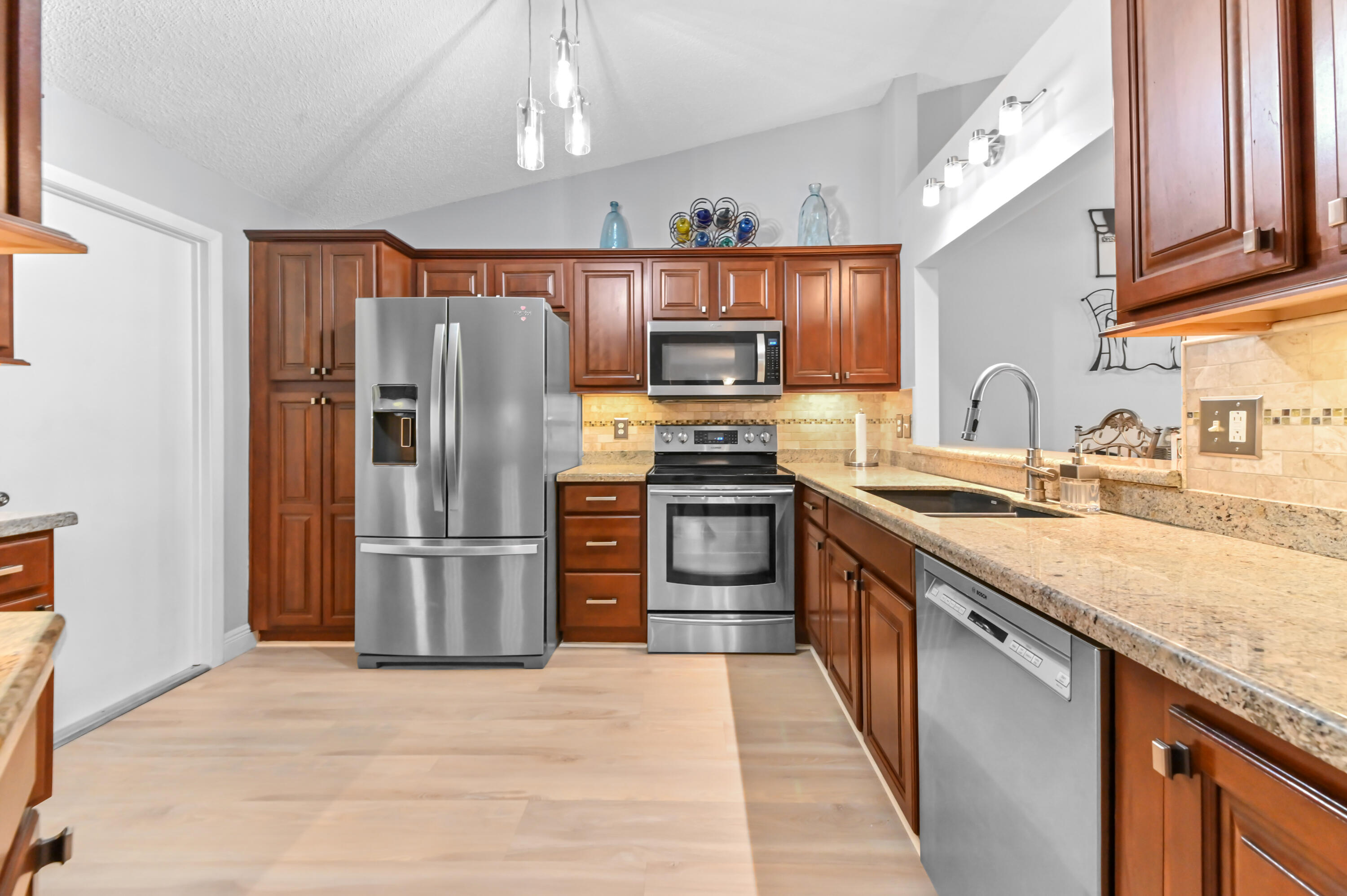 7615 Red Ruby Drive Delray Beach, FL 33446 - Photo 8 of 33 09 kitchen 01