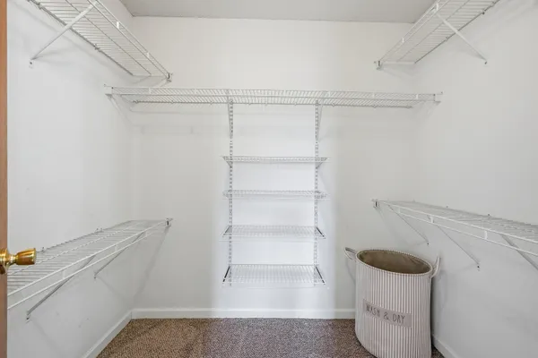 a view of an empty walk in closet