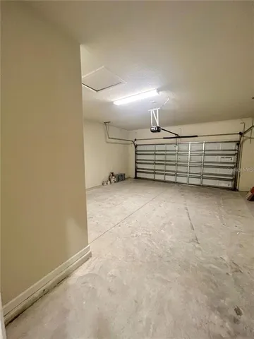 a view of a room with cabinet and a projector